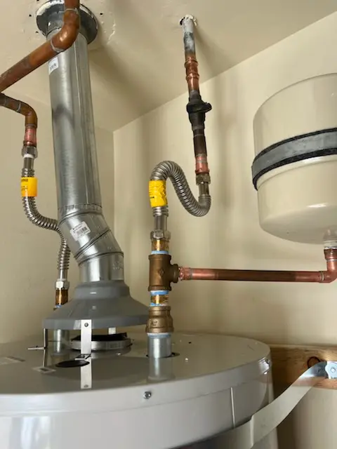 Water heater installation and plumbing repair in Andrews Gardens
